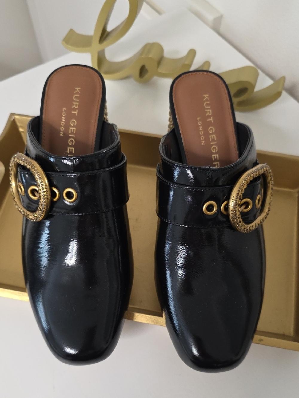 Kurt Geiger Black Patent Mules with Gold Buckle